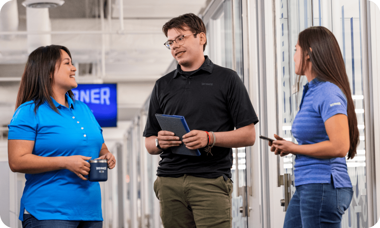 Werner employees talking at the office
