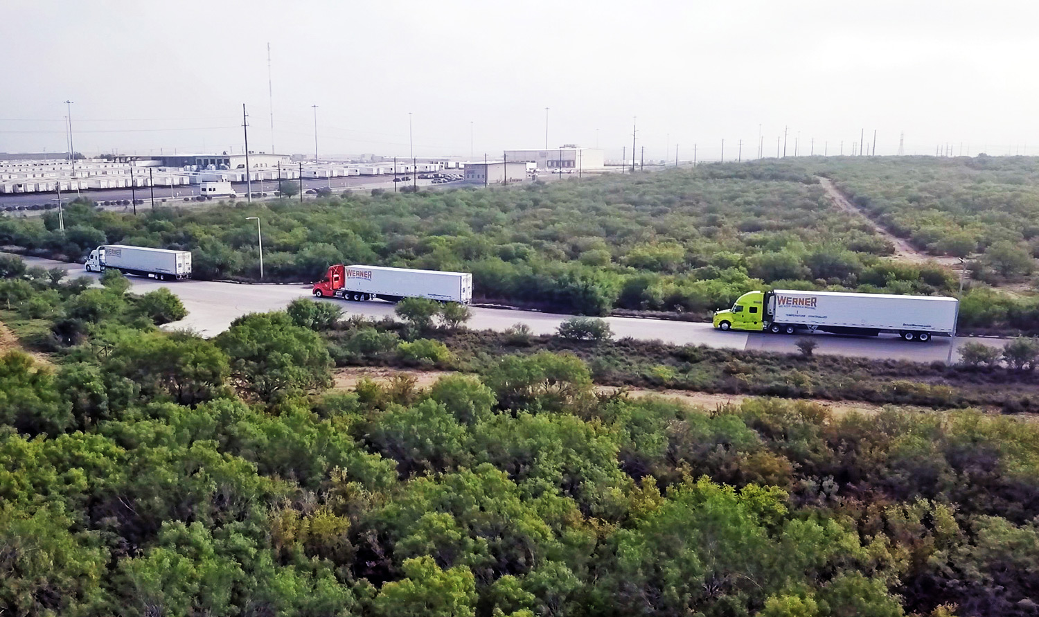 Werner fleet of trucks at U.S.-Mexico border crossing