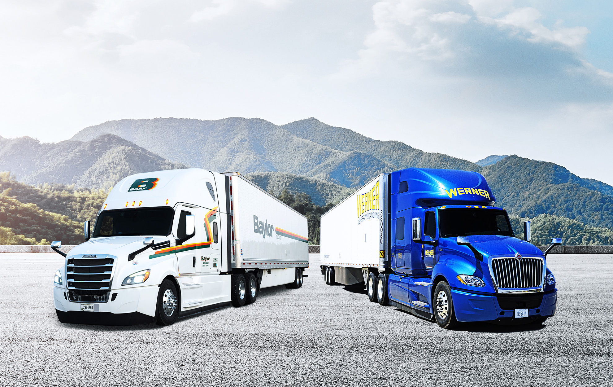 Werner and Baylor trucks next to each other on the road