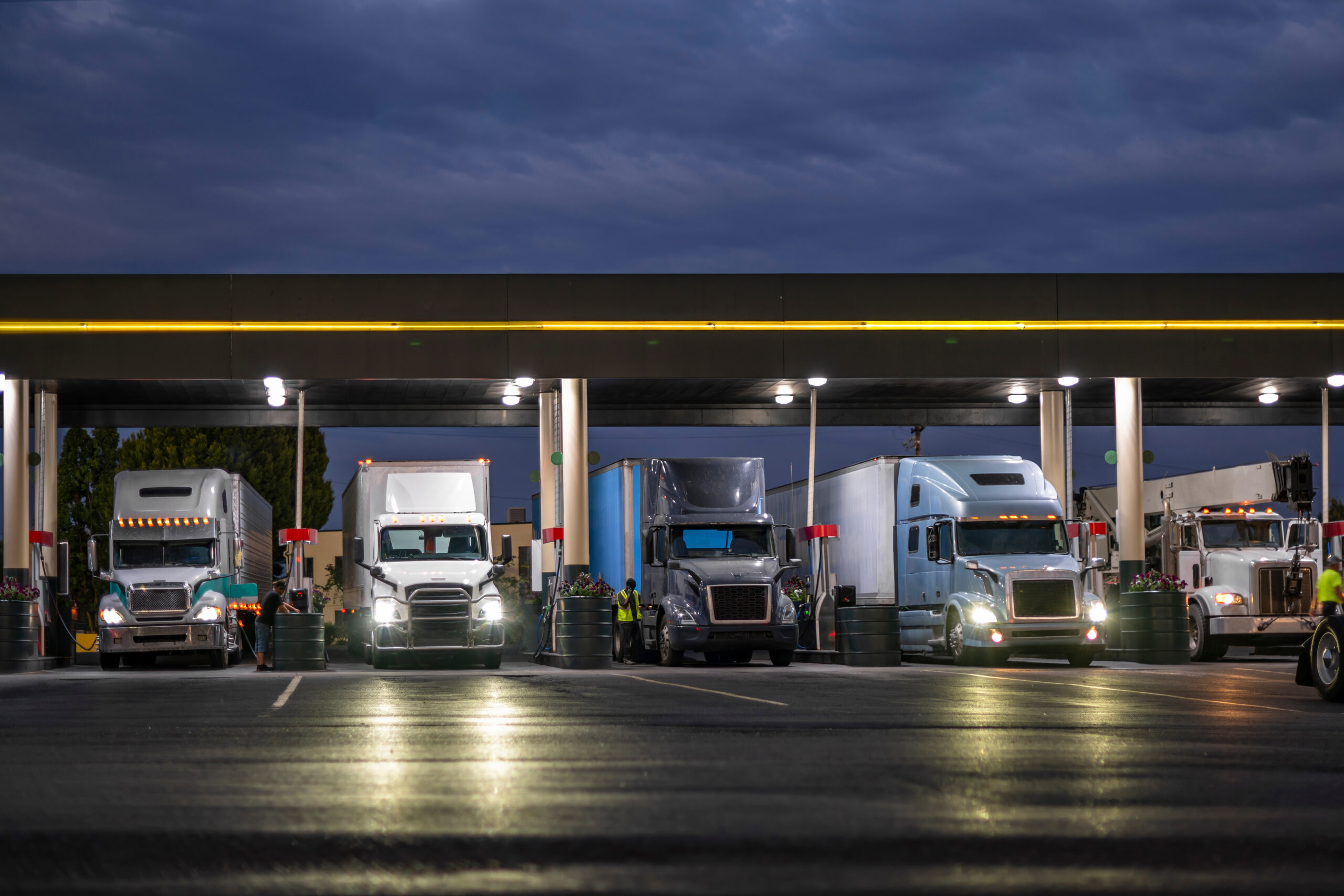 Trucks at the Gas Pumps